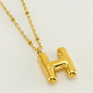 Bubble letter H necklace in gold